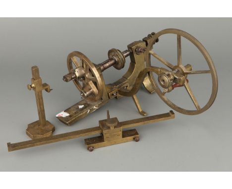 Watchmakers Lathe in brass with large driving wheel, spindle and 3 jaw chuck, with 2 other watchmakers/engineers tools in bra