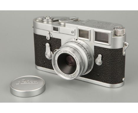 A Leica M3 Rangefinder Camera, DS, chrome, serial no. 831194, with Leitz Summaron f/3.5 35mm lens, chrome, serial no. 1690748