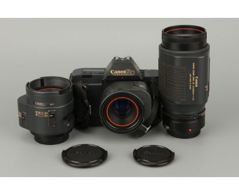 A Canon T80 SLR Camera, complete with three AF lenses, including AC f/1.8 50mm, AC f/3.5-4.5 35-70mm and AC f/4.5 75-200mm (a
