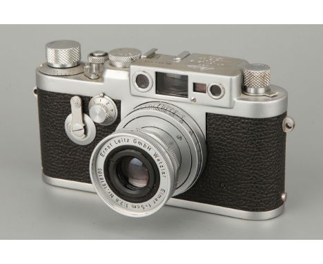 A Leica IIIg Rangefinder Camera, chrome, serial no. 956315, with Leitz Elmar f/2.8 50mm lens, chrome, serial no. 1618105