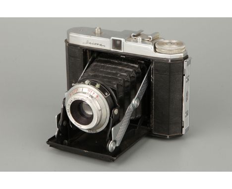 A Dacora Folding Camera, with Subita f/5.6 75mm lens, in maker's case