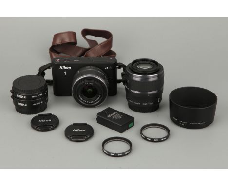 A Nikon 1 J2 Digital Compact Camera, with f/3.5-5.6 10-30mm and f/3.8-5.6 30-110mm lenses, complete with two Meike teleconver