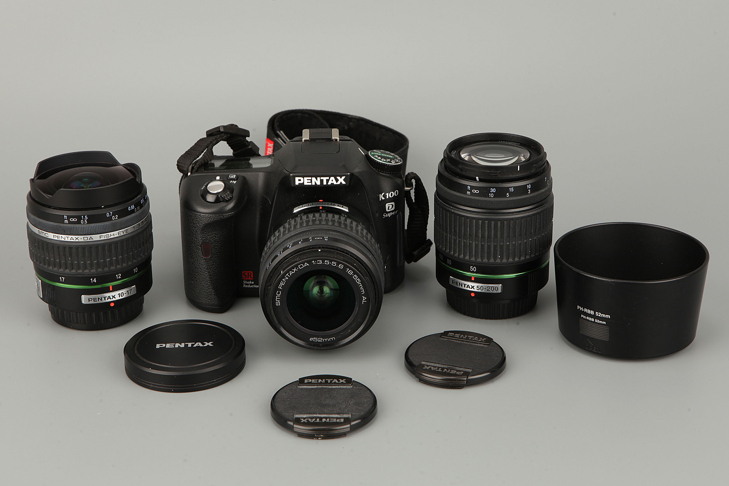 A Pentax K100 D Super Digital SLR Camera, together with Pentax-DA f/3.5