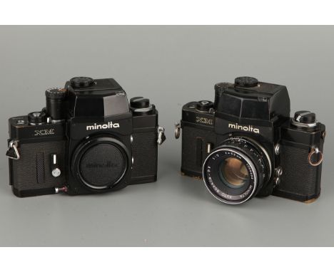 Two Minolta XM SLR Cameras, one with Rokkor-PF f/2 53mm lens, serial nos. 2122848 / 2123097 (2)