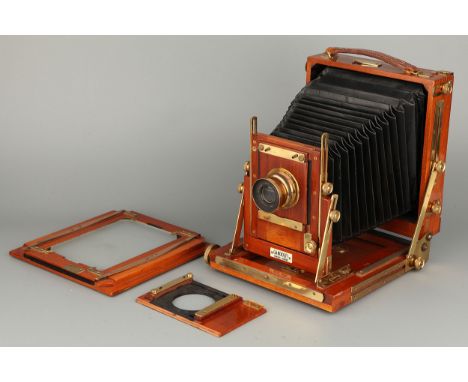 A Gandolfi 5x7 Mahogany Field Camera, with De Vere 5x4 reducing sprung back, spare lens board and Thonton Pickard-Beck Symmet