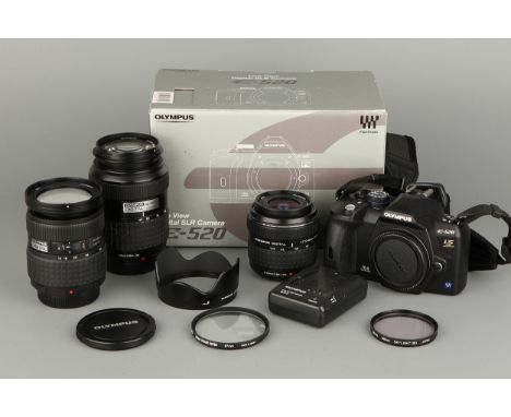 An Olympus E-520 Digital SLR Camera, together with three lenses including Zuiko Digital f/2.8-3.5 14-54mm, Zuiko Digital f/3.