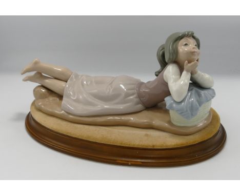 Nao Porcelain figure of  Lying Child: length 30cm 