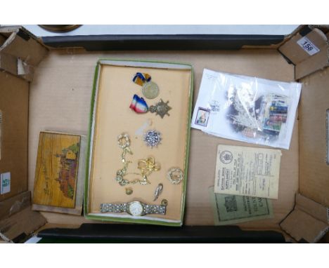 A mixed collection of items to include: costume jewelry, gents Rotary watch, WW1 Medals s7304 Dvr W Jones R.F.A, ration books