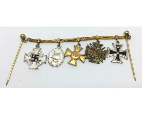 WW2 Third Reich WW1 Veterans 5 piece miniature medals set on a chain with stick pin fastener. 25 year Faithful service cross,