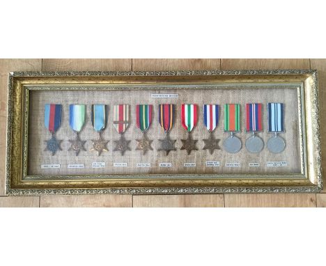 WW2 British Campaign, medals in a framed mount to include: 1939-45 Star, Atlantic Star, a replica Air Crew Europe Star, Afric