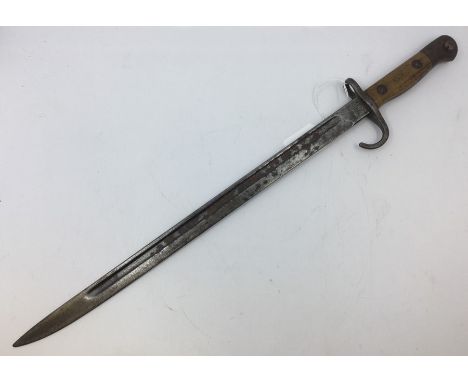 WW1 British 1907 Pattern Hooked Quillion bayonet. Single edged fullered blade 43cm in length. Dated 4 -09. Maker marked Wilki