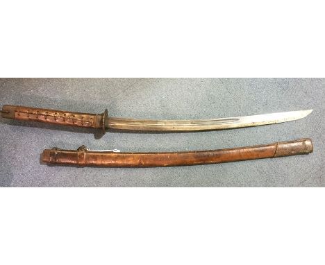 WW2 Imperial Japanese late war field made sword. Curved single edged fullered blade 59cm in length. No markings. Iron Tsuba d