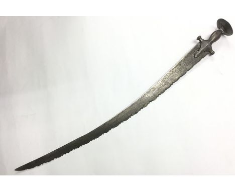 Indian Talwar style Sword with 79cm long curved single edged blade with etched decoration. Serrated edge. Overall length 90cm