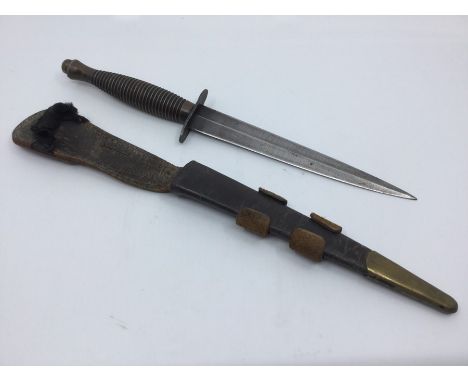 Post war British Third Pattern FS Fighting knife. 175mm long double edged blade. Overall length 295mm. Maker mark to crossgua