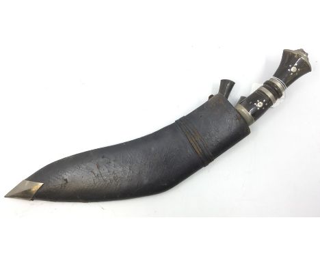 Gurkha Kukri Knife with 30cm blade with die stamped marking "India". Horn grips. Overall length 42cm. Lions head pommel. Comp