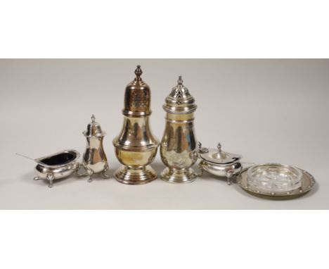 Two Elizabeth II silver sugar casters, including Mappin &amp; Webb, largest 17.5cm, a glass butter dish with silver stand and