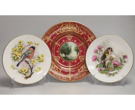 A Royal Worcester fine plate painted with a figure in a tree line landscape by G. Evans, signed and Royal Worcester plates by
