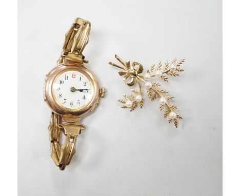 A lady's early 20th century 9ct gold, manual wind wrist watch, on a gold plated strap, together with a modern 9ct gold and se