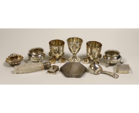 A George IV silver egg cup, London, 1821, 65mm, eight other small silver items including a pair of bun salts, 19th century ca