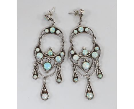A large pair of white metal and man made opal cluster set drop earrings, approx. 92mm, gross weight 29.5 grams.
