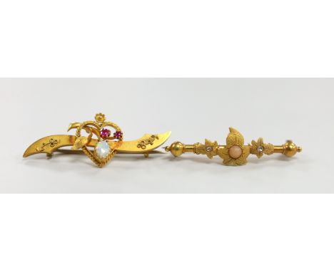An Edwardian 15ct gold, ruby and white opal set bar brooch with heart motif, 40mm and a similar yellow metal, split coral bea