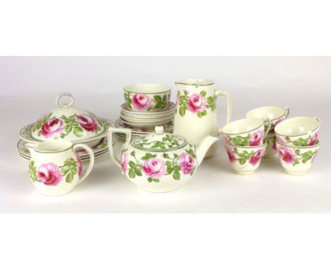 A Wedgwood tea set painted by H G Rushton with pink roses to the rim comprising, cups saucers, side plates, tea pot, sugar bo