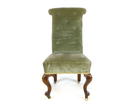 A Victorian walnut framed nursing chair with button back and scrolling legs CONDITION REPORT: Back is loose, some other joint