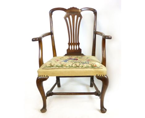 A George ll style mahogany elbow chair with pierced splat, tapestry upholstered seat, gentle out swept arms, cabriole legs. C