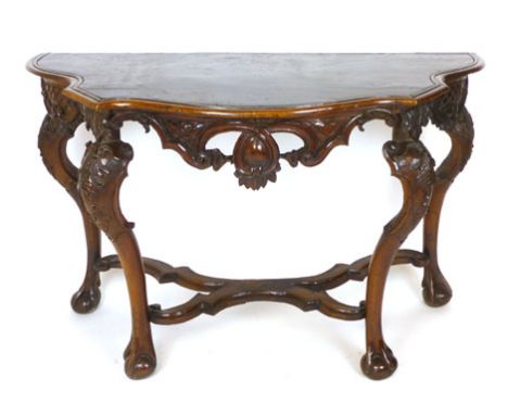 A Spanish walnut console table, 19th century, with painted leather top, pierced gallery and cabriole legs, width 133cm
#VAT w