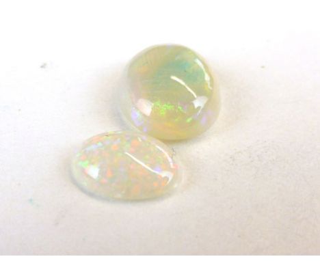 Two unmounted opal cabochons, 8mm and smaller (2)