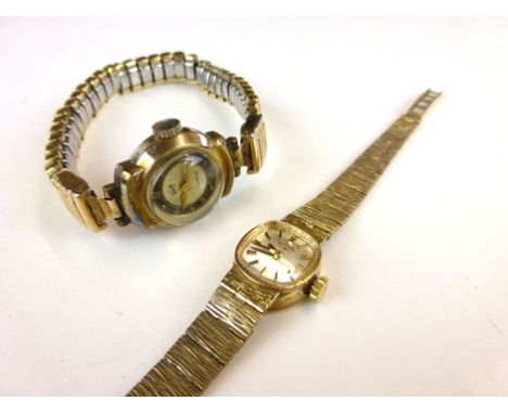 A Rotary 9ct gold ladies wrist watch, with bark effect bracelet, hallmarked; and another gold plated watch (2) CONDITION REPO