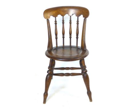 A Victorian walnut chair, spindle back on a circular button seat, turned legs and 'H' stretcher. CONDITION REPORT: Generally 