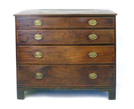 A George lll mahogany bow fronted chest of four graduate long drawers, the top with cross banding and line inlay. h. 89 cm, w