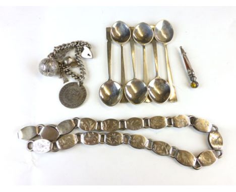 A silver charm bracelet and attachments, a white metal chain, a stone mounted brooch and a set of silver tea spoons (parcel)