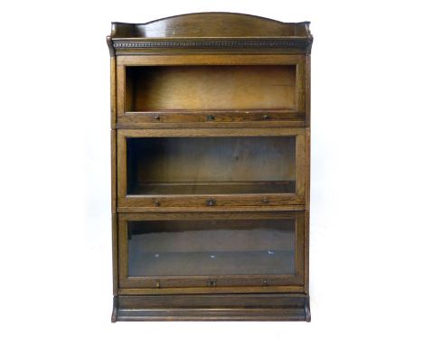 The Lebus oak globe wernick style three tier bookcase. h. 120 cm
 CONDITION REPORT: Good with some surface wear and scratches