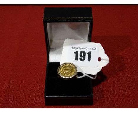 A 1/10th Krugerrand Gold Coin Within A 9ct Gold Ring Mount