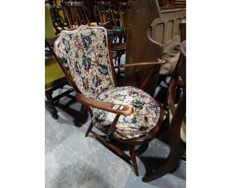 An Ercol Elbow Lounge Chair