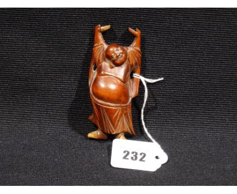 A Japanese Carved Hardwood Figure Of Ho Tei
