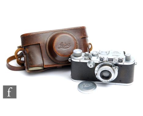 A 1935 Leica IIIA rangefinder camera, serial no. 170890, chrome finish, Leitz 1:35 f50mm lens, with cap and original case. 