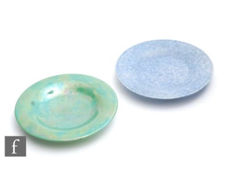 Two Ruskin Pottery shallow saucer dishes, the first in an apple green lustre, the second in a mottled blue, both with impress