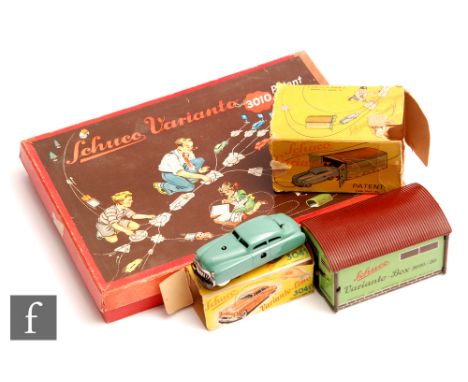A collection of Schuco Varianto, to include a boxed Varianto-Limo 3041 in green with key and instructions and a boxed 3010 G 