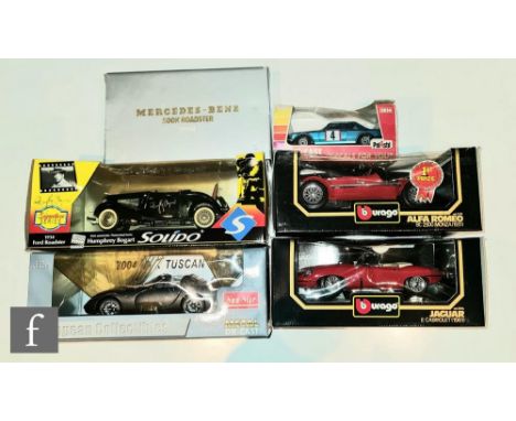 Six larger scale diecast models, mostly 1:18 scale, comprising Sun Star 4461 2004 TVR Tuscan Mk2, Solido 1934 Ford Roadster H