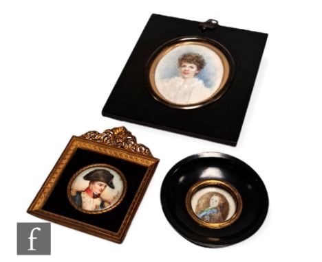 L.MIGUEL AFTER ISOBEY (EARLY 20TH CENTURY) - Portrait of Napoleon Bonaparte, a miniature on ivorine, signed, circular, framed