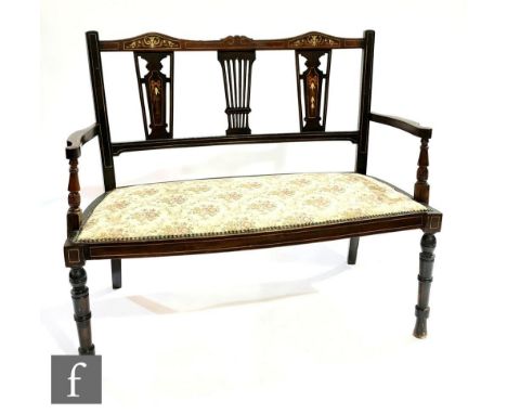 An early 20th Century marquetry inlaid two seater settee, pierced vase splat over a tapestry seat on turned legs, width 105cm