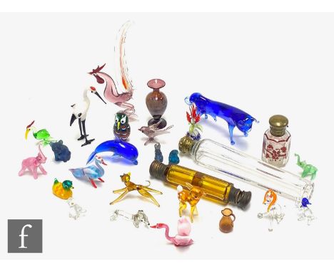 An assorted collection of glass ware to include lamp worked animals, minature vases and scent bottles. (qty) 