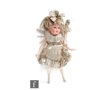 An Armand Marseille bisque socket head fairy doll with sleeping blue eyes, open mouth with teeth and blonde wig, head impress