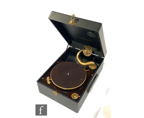 A Columbia wind up portable gramophone in black leather, model No 2112. 