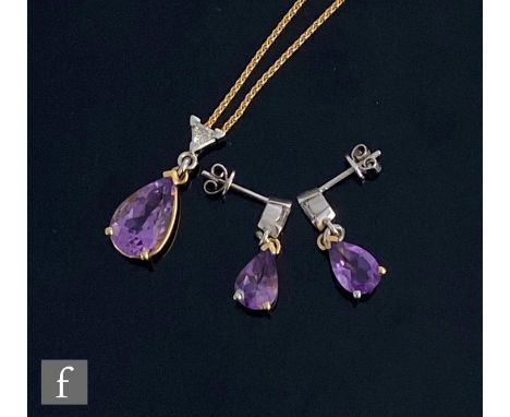 A modern 18ct amethyst and diamond pendant, pear shaped amethyst below trillion cut diamond, length 22mm, suspended from an 1