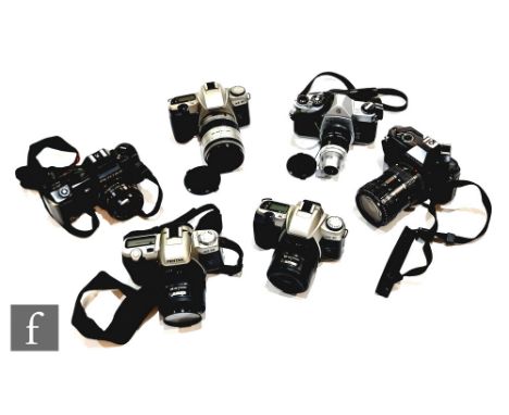 A collection of Pentax cameras, to include MZ-30 with a SMC Pentax - FA 1:3.5-5.6 28-80mm lens, P30 with a Pentax-A zoom 1:3.