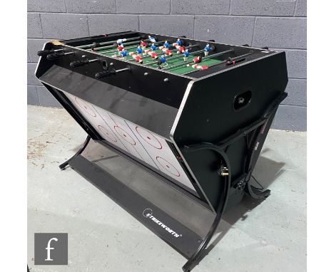 A Strikeworth Trisport multi-games table, the compact rotating table with pool table, air hockey and foosball, sold without a